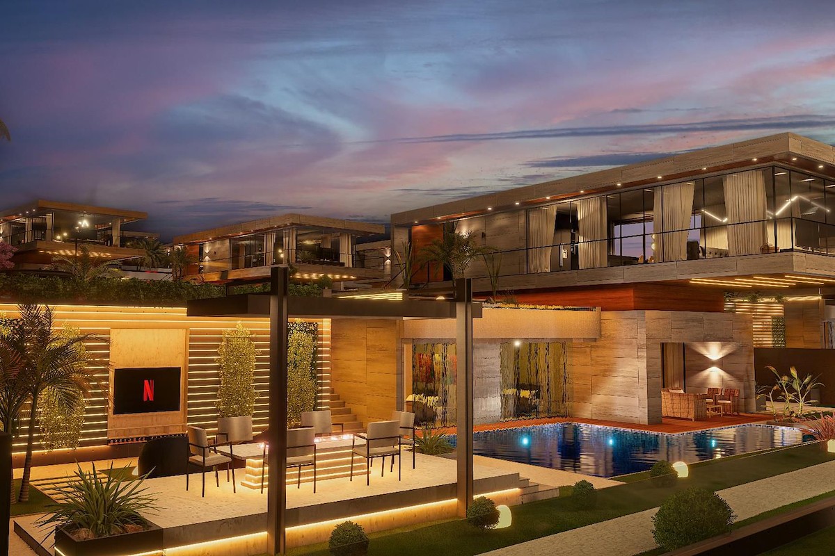 Side view of a modern villa with a palm tree